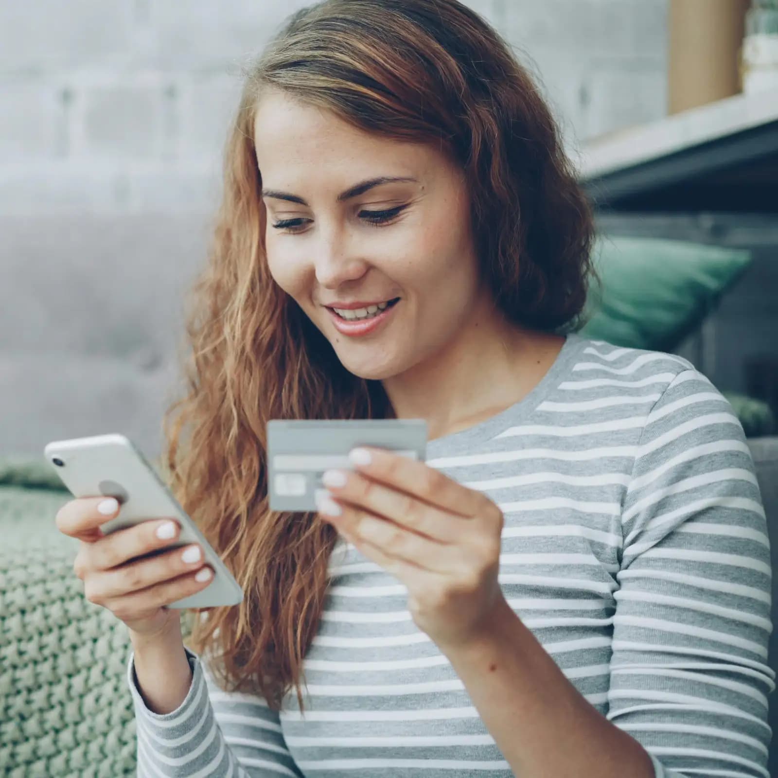 A person paying securely by card on their phone